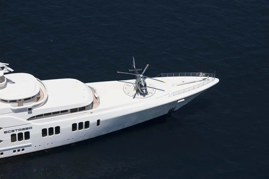 Luxury superyacht with touch-and-go helipad viewed from above