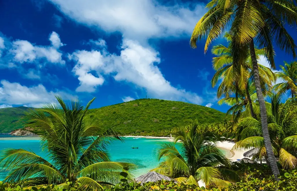Caribbean beach and turquoise water during a yacht charter