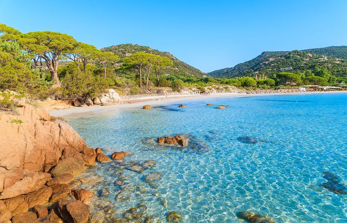 Azure crystal clear sea water of Palombaggia beach on Corsica island