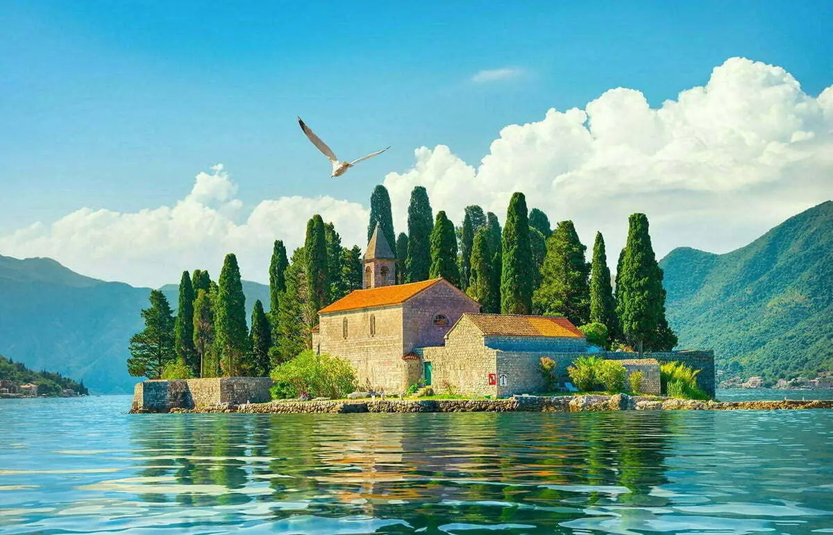 Our Lady of the Rocks church and Perast village in the Bay of Kotor, Montenegro