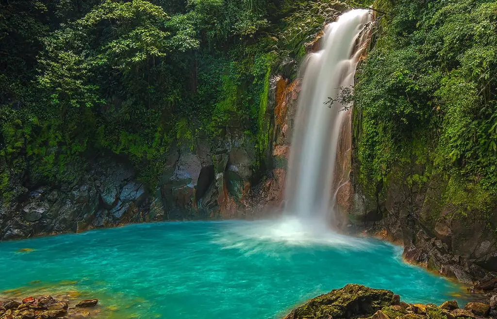 Rio Celeste waterfall in Costa Rica, a spectacular inland excursion accessible during a luxury yacht charter
