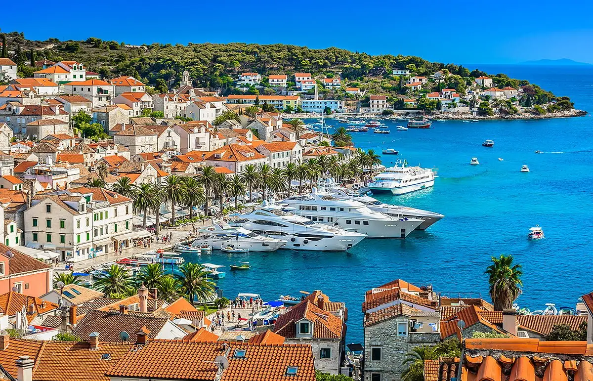Hvar Town, Croatia – Luxury Yachts Docked Along the Waterfront and Historic Stone Buildings