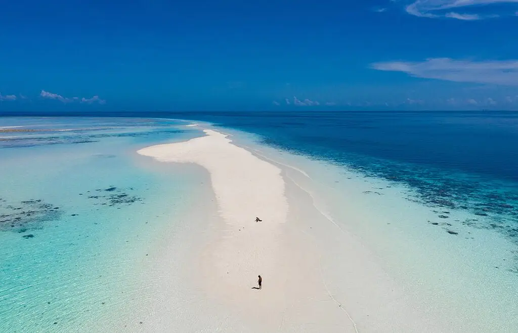 Pacific Ocean sandbar lagoon in French Polynesia luxury yacht charter destination