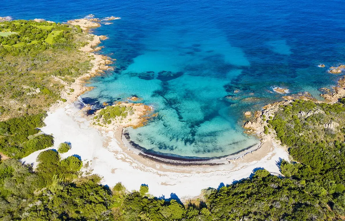 Spiaggia del Principe, Sardinia – Curved White Sand Beach with Crystal-Clear Water