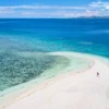 fiji-AdobeStock_295990524-hd - Echonautique.com remote island in Fiji overlooking blue coral reef