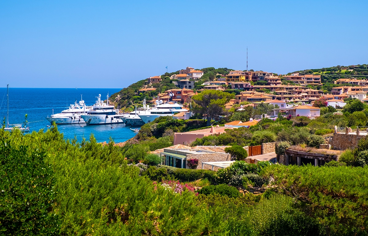Porto Cervo Marina in Sardinia, aerial view of luxury yachts and Costa Smeralda coastline