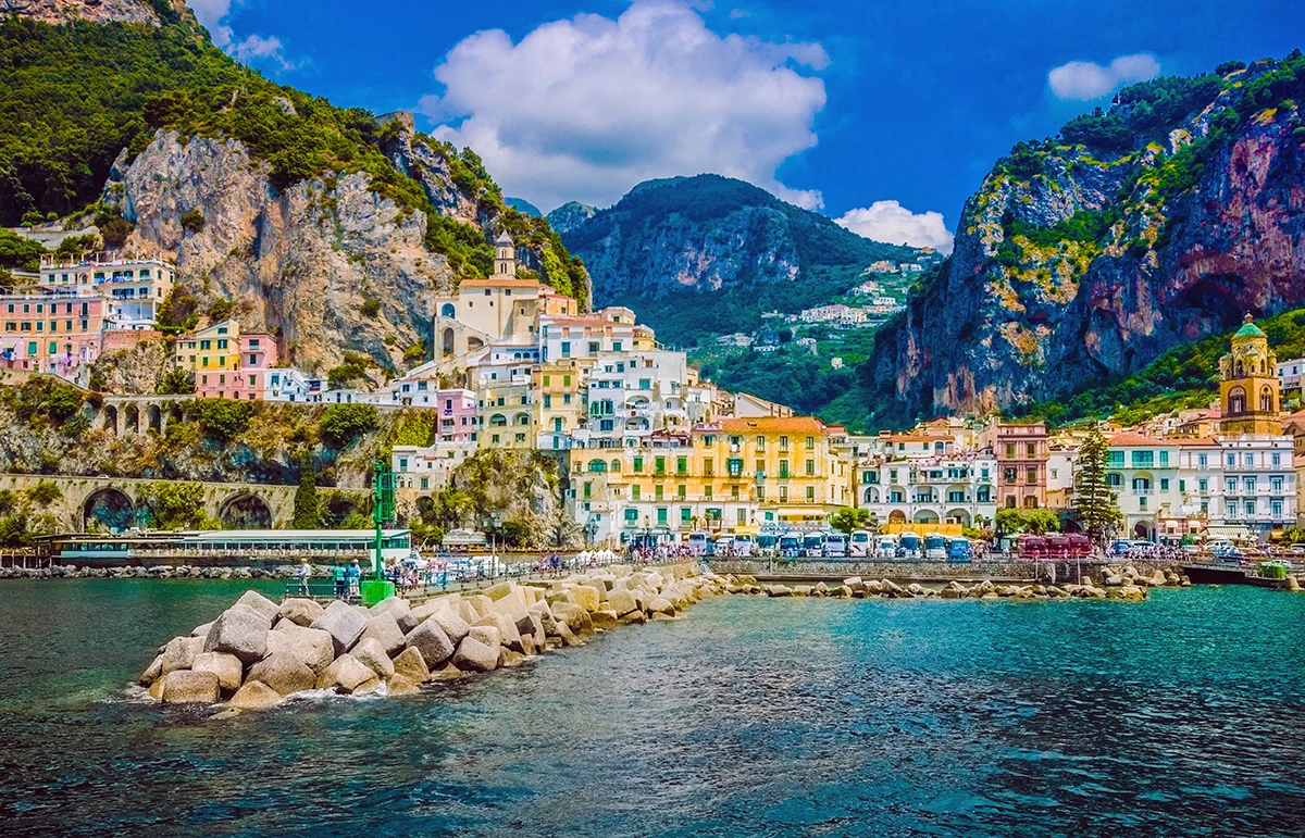 Colorful coastal town of Amalfi viewed from the sea on a sunny day