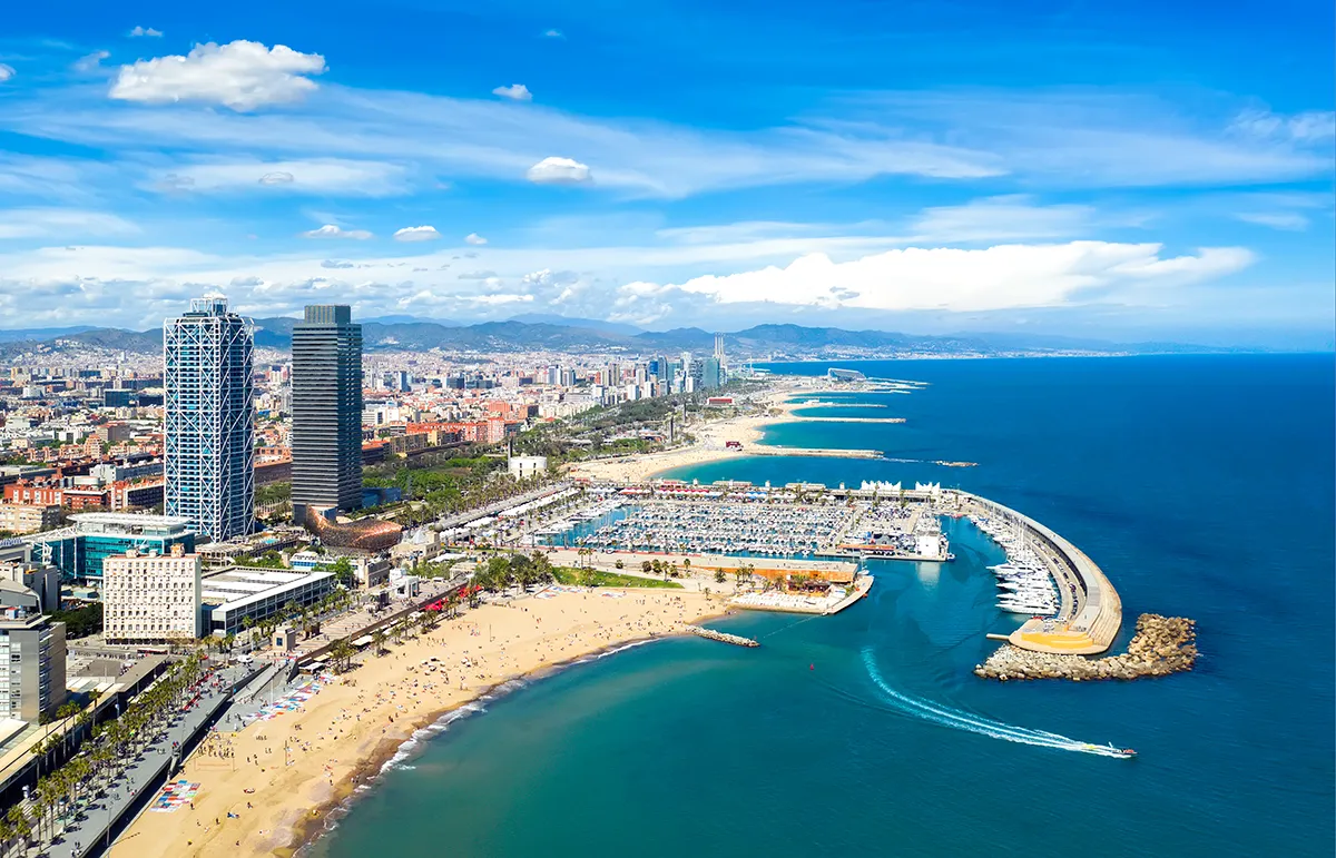 Barcelona yacht charter coastline beach skyline Spain luxury marina Mediterranean