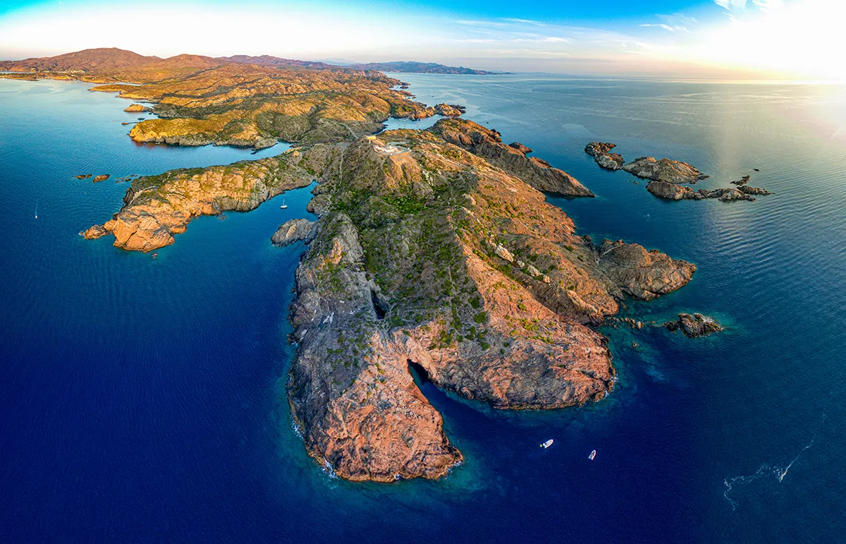 Costa Brava yacht charter Cap de Creus Spain aerial view Mediterranean coastline anchorage
