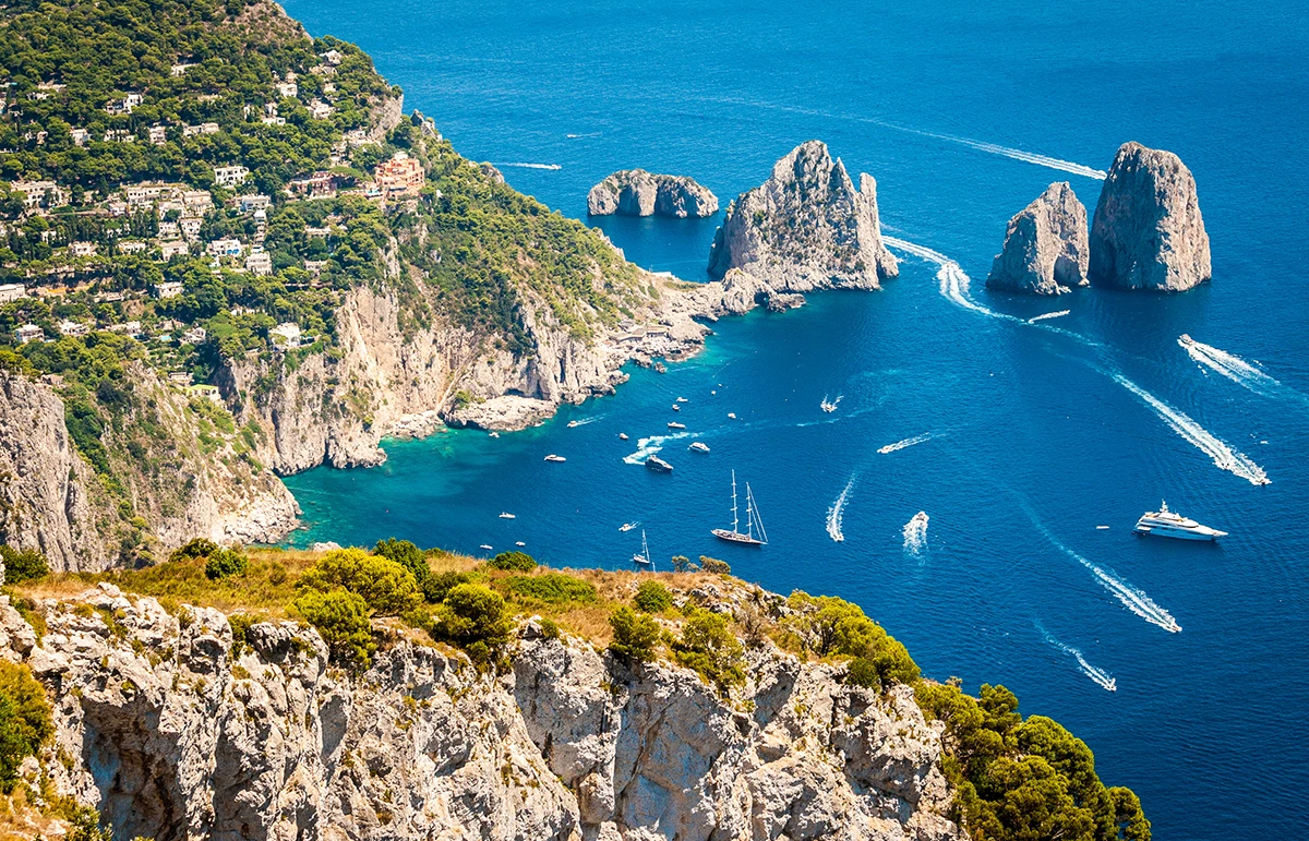 Italy-Capri-faraglioni - Echonautique.com Capri, Faraglioni in the mediterranean sea. Italy, Naples