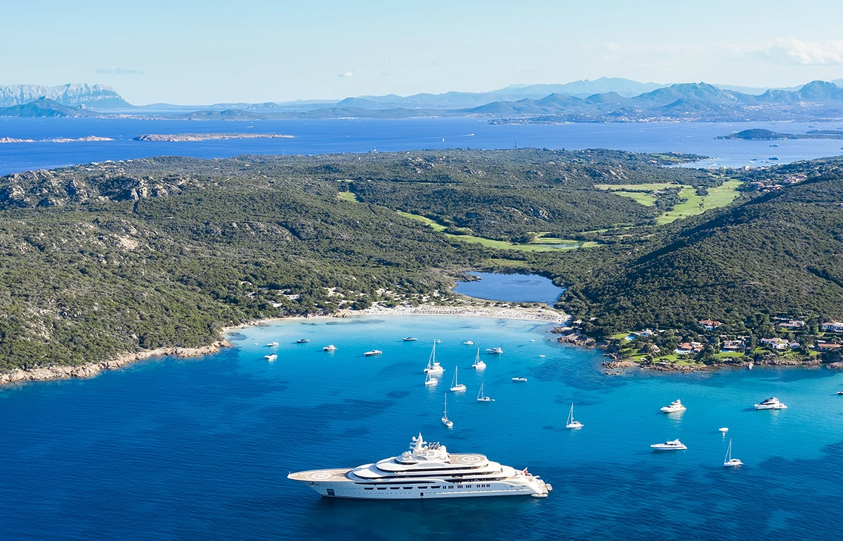 Pevero Bay Costa Smeralda Sardinia aerial view yacht anchorage turquoise water