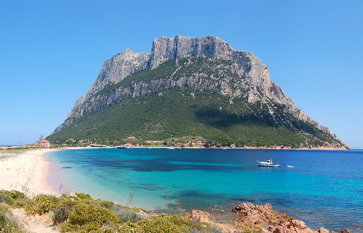 Tavolara Island Sardinia seen from the beach turquoise water Costa Smeralda yacht anchorage