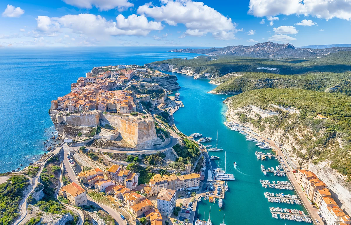Bonifacio harbor Corsica aerial view limestone cliffs marina Strait of Bonifacio