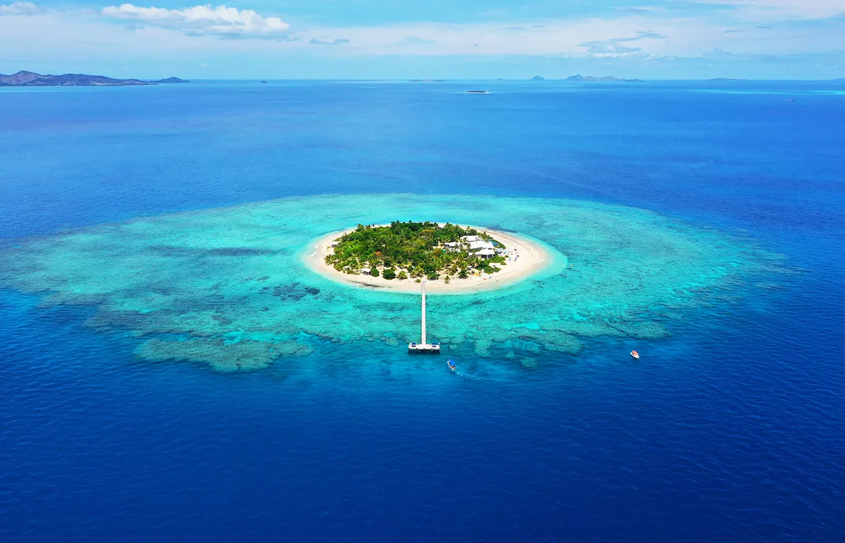 Remote lagoon island in the Pacific Ocean luxury yacht charter destination