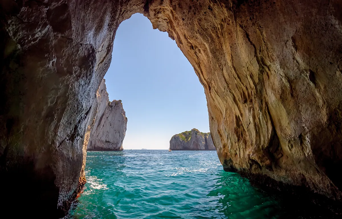 Blue Grotto Capri Yacht Charter Experience - Echonautique.com View from inside the Blue Grotto in Capri during an Amalfi Coast yacht charter