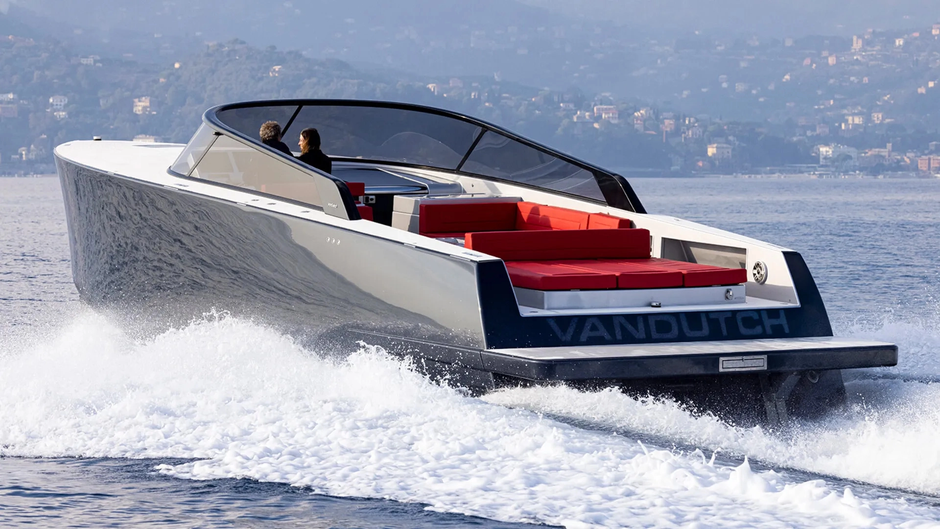 vandutch-48-1920x1080px-2 - Echonautique.com Vandutch 48' with red cushioned seating slicing through the water at speed